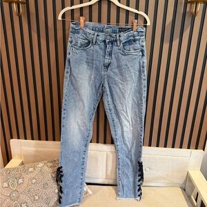 Blank NYC High Rise Tapered Light Blue Skinny Jeans with Black Lace Up Details